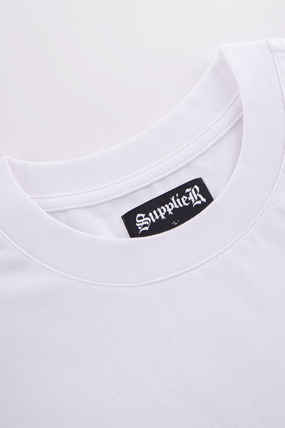 Outline Cross Tee