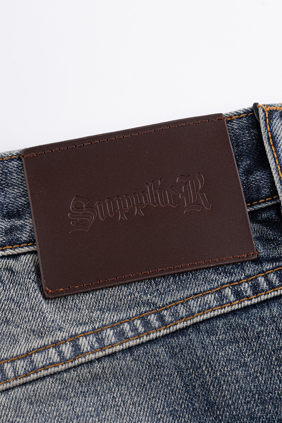 Multiple Cross Leather Patch Baggy Denim