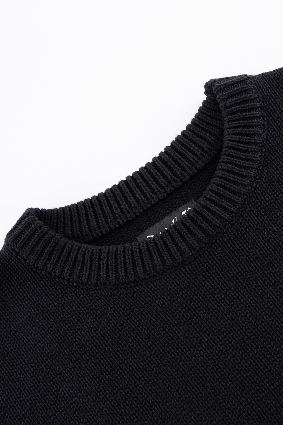 Tribal Cross Leather Patch Crew Knit