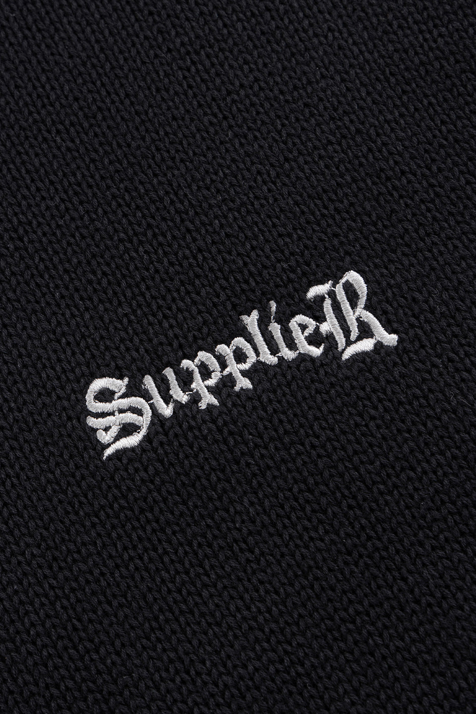 Tribal Cross Leather Patch Crew Knit